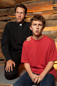 Pictured Left to Right: Wylie Herman as Matthew and Michael Rosen as Garret in 100 Saints You Should Know by Kate Fodor; a Theatre Rhinoceros Production at Thick House Theatre. Photo by Kent Taylor.
