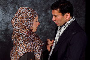 Pictured left to right: Kim Stephenson as Woman and Rudy Guerrero* as Man and in "Seven Palestinian Children" by Deborah S. Margolin  (Part of the evening entitled "Drunk Enough to Say I Love You?") Directed by John Fisher; A Theatre Rhinoceros Production at The Costume Shop. Photo by Kent Taylor. 