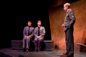 Elijah Guo as Tom, Joshua Lomeli as Jesse, and John Fisher as Capt. Franklin in Fighting Mac! by John Fisher; a Theatre Rhinoceros production at Thick House; Photo by Kent Taylor.