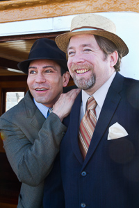Pictured left to right: Rudy Guerrero* as Wilson Mizner and Bill Fahrner* as Addison Mizner in ROAD SHOW music and lyrics by Stephen Sondheim, book by John Weidman, directed by John Fisher, photo by Kent Taylor; A Theatre Rhinoceros Production at the Eureka Theatre.