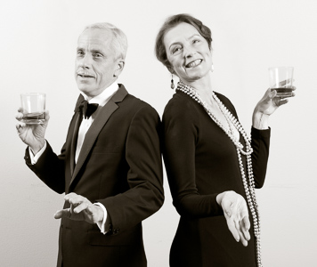 Pictured left to right: John Fisher as Sir Hugo Latymer and Sylvia Kratins as Carlotta Gray in Noël Coward’s A Song at Twilight. A Theatre Rhinoceros Production at Z Below. Photo by David Wilson. 